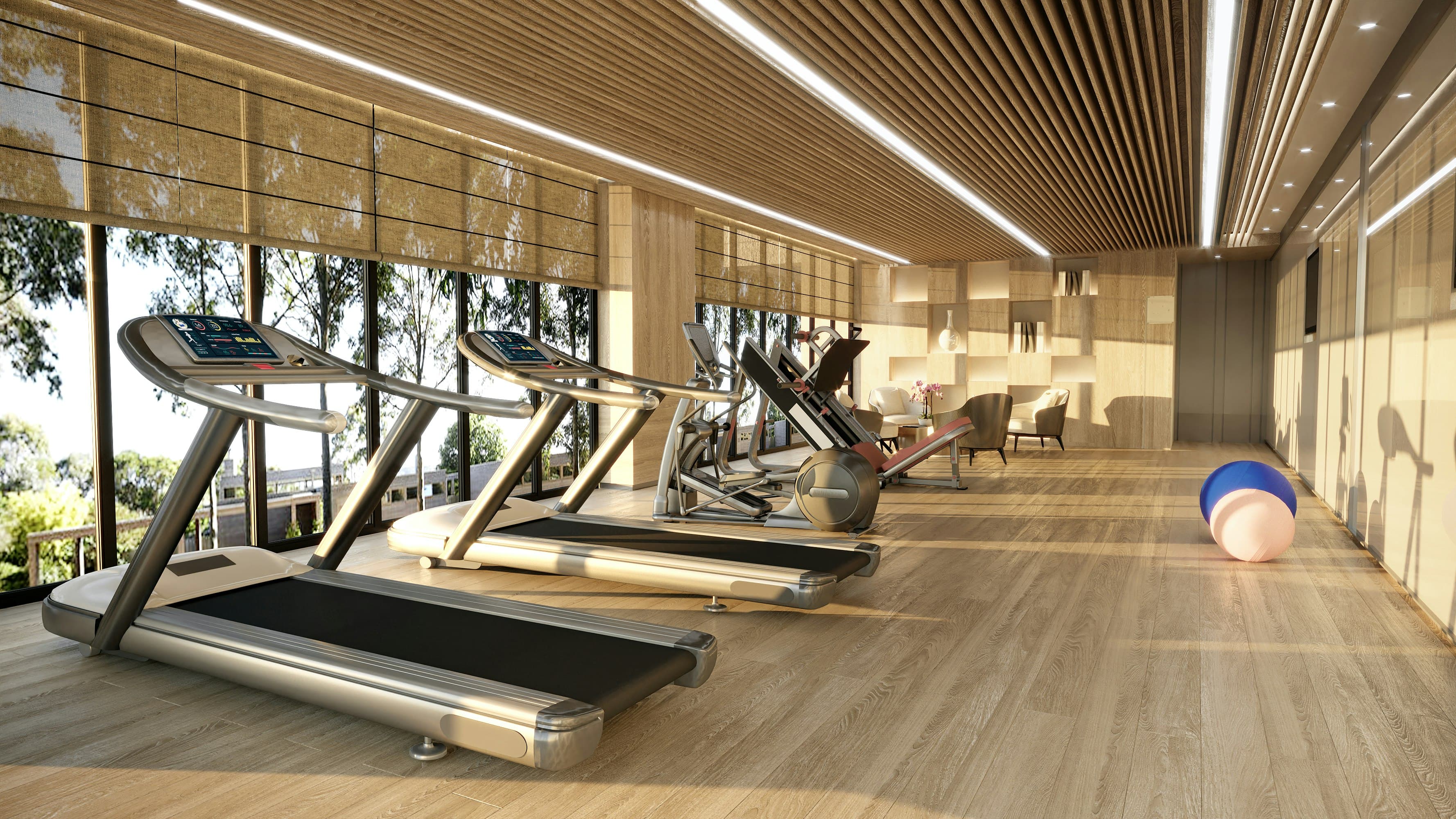 Plateau cardio sous plafond à lames de bois, tapis de course face aux baies vitrées